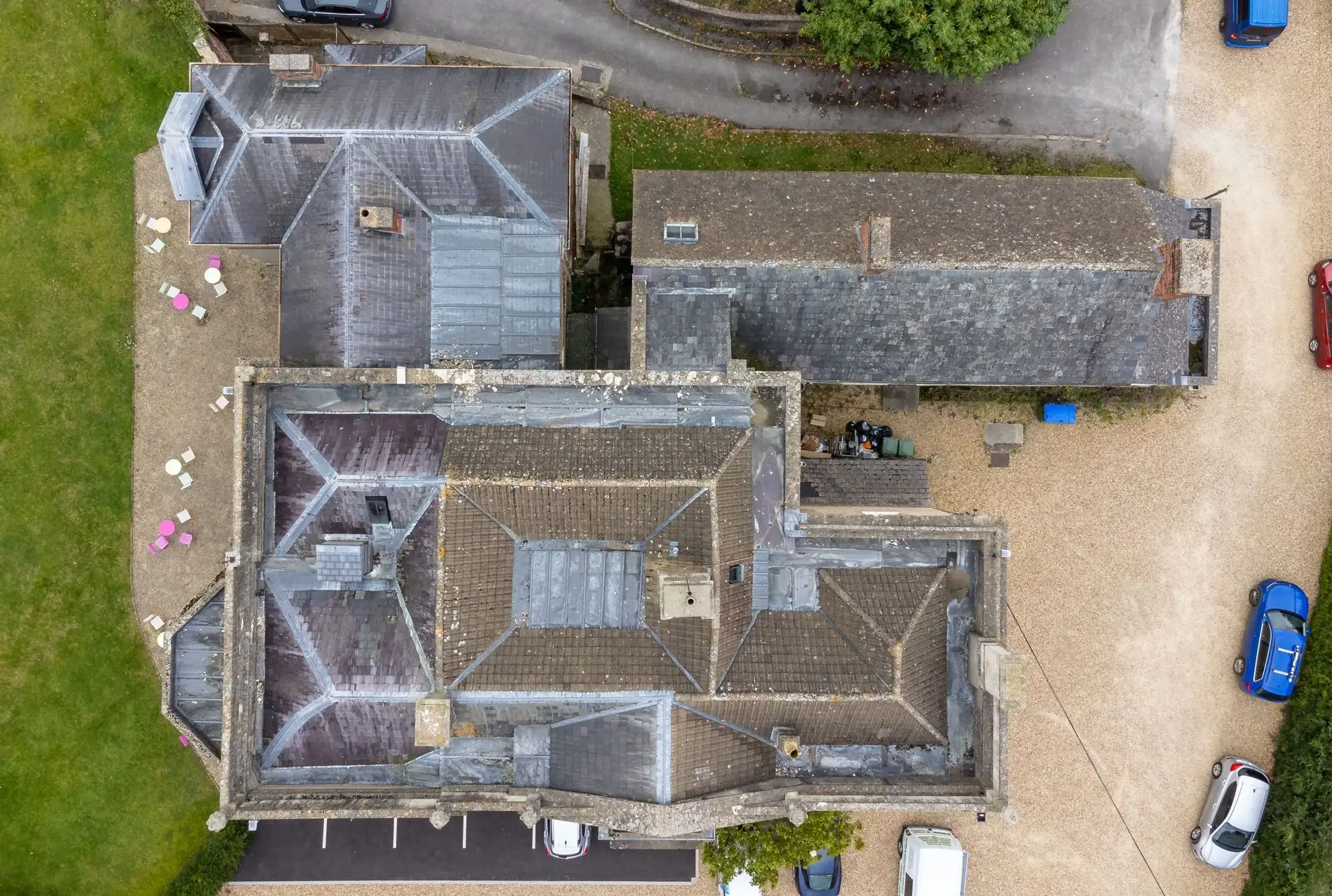 Roof features that increase inspection complexity, including chimneys, dormers, rooflights and junctions